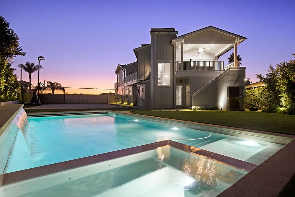 Backyard pool with waterfall Redondo Beach by Premier Builders Pool & Spa